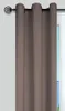 A close-up of a brown curtain hanging from a curtain rod. Podgląd zdjęcia produktu