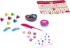 A collection of hair accessories and makeup toys. Produktbild-Vorschau