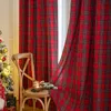 A Christmas-themed scene with plaid curtains, a wooden chair, and a decorated Christmas tree. Produktbild-Vorschau