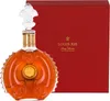 A bottle of Remy Martin Louis XIII cognac and its red presentation box. Produktbild-Vorschau