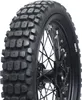 A close-up of a motorcycle tire mounted on a wheel. Produktbild-Vorschau