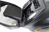 A close-up view of the interior of a vacuum cleaner, showing an open compartment with a foam filter and a white dust bag. Produktbild-Vorschau