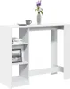 A white bar table with shelves on the side, a vase with flowers, and a cup on top. Náhled obrázku produktu