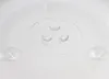 A close-up, top-down view of a clear glass microwave turntable plate on a white background. Náhľad obrázku produktu
