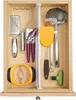 A wooden kitchen drawer filled with various utensils. Produktbild-Vorschau