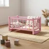 Ein Puppenbett aus Holz, eine rosa Wiege mit grauer Produktbild-Vorschau 6