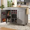 A gray kitchen island with a wooden countertop is shown in a well-lit room with a window in the background. Podgląd zdjęcia produktu