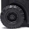 A close-up of a rugged black wheel with a thick tread pattern, attached to a black case. Náhled obrázku produktu