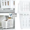 Collage of images showing white storage baskets, one with a lid, on a kitchen counter. Produktbild-Vorschau