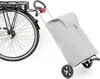 A shopping trolley attached to the rear rack of a bicycle. Podgląd zdjęcia produktu