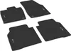 Four black rubber floor mats for a car, arranged diagonally on a white background. Produktbild-Vorschau