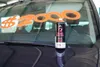 A spray can of erasable chalk paint is placed on the hood of a car, with an orange price tag of $2000 written on the windshield. Produktbild-Vorschau