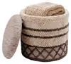 Sitzhocker mit Stauraum aus Wolle, Boho-Design Beige, 40 cm rund mit geöffnetem Deckel und Wolldecke im Inneren.