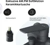 A close-up marketing image showing a black faucet and a ceramic cartridge, with text highlighting product features. Produktbild-Vorschau