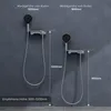 Two shower fixtures are shown mounted on a dark gray wall, illustrating different installation heights. Produktbild-Vorschau