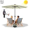 A couple relaxing in deck chairs under a large beige patio umbrella with solar-powered LED lights. Náhľad obrázku produktu