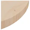 A close-up view of the edge of a round wooden tabletop. Voir les images du produit