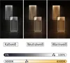 Three panels showing a modern LED ceiling light in different color temperatures and brightness levels, with text labels and sliders below. Anteprima dell’immagine prodotto