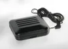 A black electronic device with a cord and plug is shown on a white background. Produktbild-Vorschau