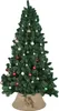 A decorated Christmas tree with ornaments and a tree skirt. Voir les images du produit