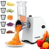 A white electric vegetable slicer with multiple attachments, shown with shredded carrots and other vegetables. Produktbild-Vorschau