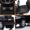 A collage of four images showing different views of a black Land Rover Discovery ride-on car. Produktbild-Vorschau