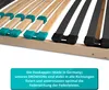 Close-up of a bed frame's slatted base, showing wooden slats with teal and black plastic caps. Produktbild-Vorschau