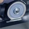 A grinding wheel is being used to grind a piece of metal. Anteprima dell’immagine prodotto