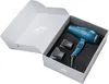 A blue hairdryer and two attachments are neatly arranged in a white box with a black insert. Náhled obrázku produktu