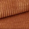 A close-up view of brown corduroy fabric. Podgląd zdjęcia produktu