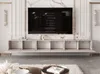 A modern living room with a TV stand and a large television. Produktbild-Vorschau
