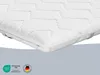 A close-up shot of a white mattress topper with a quilted surface and a zipper. Náhled obrázku produktu