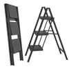 A black metal step stool is shown in two configurations: folded and unfolded. Náhled obrázku produktu