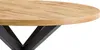 A close-up view of a round dining table with a wood-grain top and a black metal base. Produktbild-Vorschau