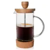 A French press coffee maker filled with coffee. Produktbild-Vorschau