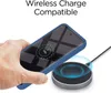 A hand holding a blue phone case over a wireless charger. Produktbild-Vorschau