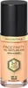 A product shot of a bottle of foundation. Voir les images du produit