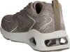 A side view of a beige sneaker with glitter accents and a clear air bubble in the sole. Voir les images du produit