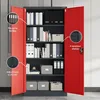 An open metal cabinet with red doors, filled with files and boxes. Produktbild-Vorschau