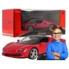 A child is shown next to a toy Ferrari car and its packaging. Produktbild-Vorschau