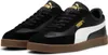A pair of black Puma sneakers with white and gold accents, shown from a slightly elevated side angle on a white background. Voir les images du produit