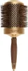 A professional studio shot of a round hairbrush against a white background. Produktbild-Vorschau