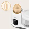 A close-up shot of a white baby food maker with a bottle inside, and an icon of a baby bottle in the upper left corner. Produktbild-Vorschau