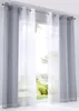 A window with sheer and opaque curtains, showing a garden view outside. Produktbild-Vorschau