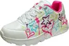 A single white sneaker with colorful graffiti-style graphics. Produktbild-Vorschau