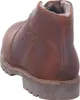 A close-up side view of a brown leather boot. Voir les images du produit