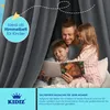 A father is reading a book to his two children under a canopy. Produktbild-Vorschau