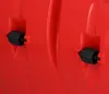A close-up view of two black knobs attached to a red surface, likely part of a snow shovel or similar equipment. Produktbild-Vorschau