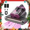 A handheld vacuum cleaner with a purple dustbin and gray body, shown with accessories and a pink graphic indicating suction. The image is framed by Christmas decorations. Produktbild-Vorschau