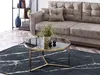 A living room scene with a sofa, coffee table, and rug. Náhled obrázku produktu